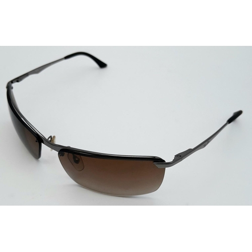 127 - A Pair of Ray Ban Sunglasses - With case that needs restitching.