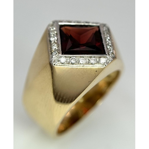 909 - AN 18K YELLOW GOLD, DIAMOND AND RED STONE RING. SIZE M1/2.  10.4G