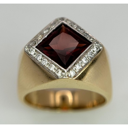 909 - AN 18K YELLOW GOLD, DIAMOND AND RED STONE RING. SIZE M1/2.  10.4G