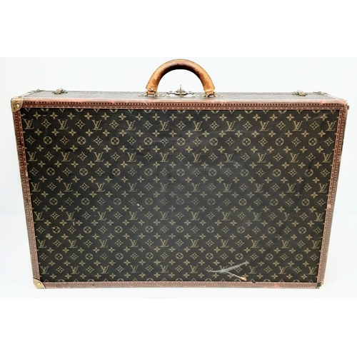 599 - A Vintage Louis Vuitton Bisten 80 Trunk. Famous Monogram Leather With Gold Tone Hardware. Size 80x52... 