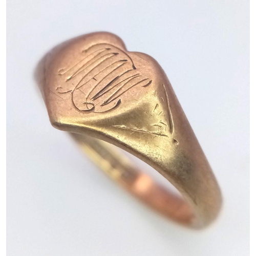 283 - A VINTAGE 9K GOLD HEART SHAPED RING WITH THE INITIALS 