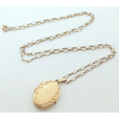 317 - A VINTAGE 9K GOLD LOCKET ON A 54cms 9K GOLD BELCHER LINK CHAIN .  3.6gms