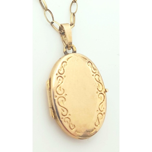 317 - A VINTAGE 9K GOLD LOCKET ON A 54cms 9K GOLD BELCHER LINK CHAIN .  3.6gms