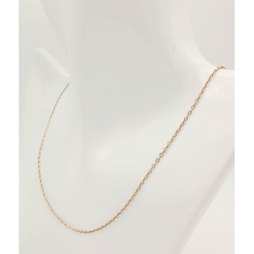 331 - A 9K GOLD FINE NECK CHAIN .   2.2gms   50cms