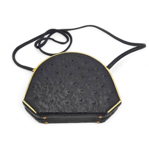 44 - An Asprey of London Black Ostrich Shoulder Bag. Comes with original Asprey box and mirror. Gilded ha... 