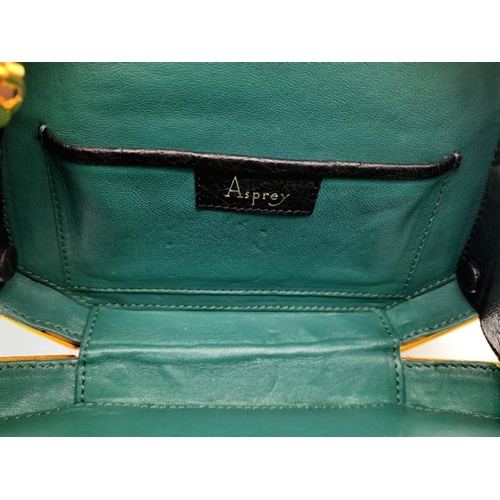 44 - An Asprey of London Black Ostrich Shoulder Bag. Comes with original Asprey box and mirror. Gilded ha... 