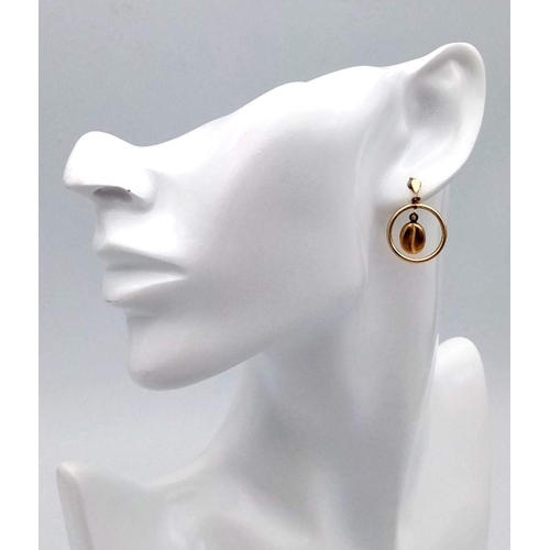 458 - A PAIR OF 9K GOLD EARRINGS IN A COFFEE BEAN DESIGN.   1.8gms