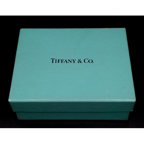 487 - A Tiffany and Co. 925 Sterling Silver Apple. 5.5cm. In Tiffany packaging. Ref: 017362