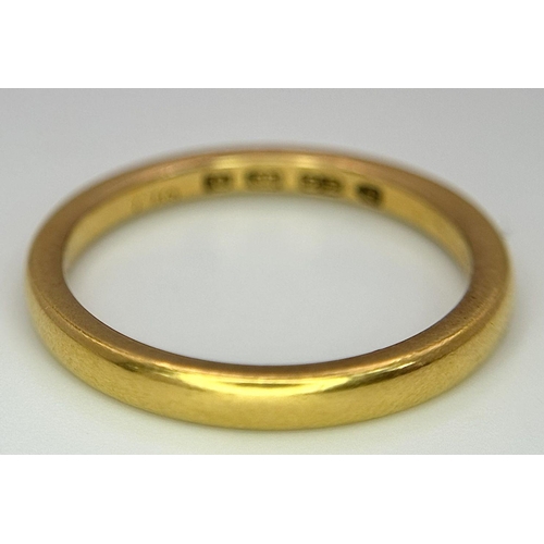 73 - A 22K GOLD BAND RING .   5.6gms   size T