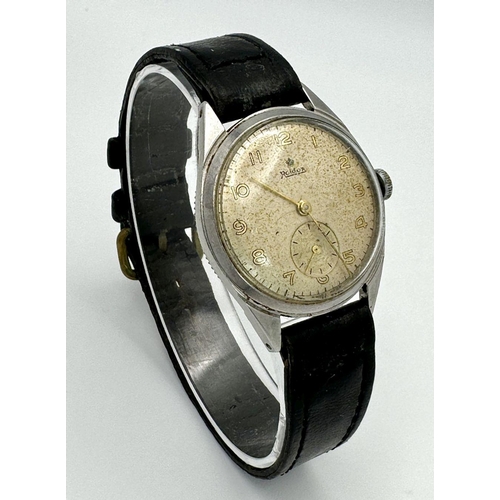 789 - A Vintage (1950s) Roldor Mechanical Gents Watch. Black leather strap. Stainless steel case - 31mm. P... 