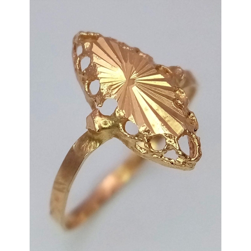 804 - A VERY CUTE 18K GOLD SUNBURST PATTERN RING .  0.8gms    size I