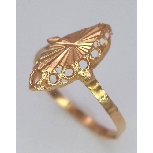 804 - A VERY CUTE 18K GOLD SUNBURST PATTERN RING .  0.8gms    size I