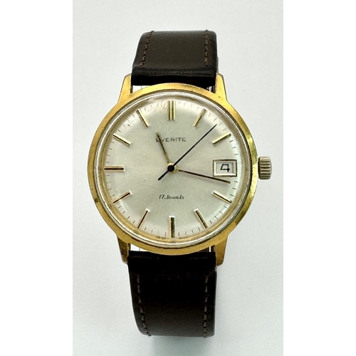 810 - A Vintage Everite 17 Jewels Mechanical Gents Watch. Brown leather strap. gilded case - 34mm. Silver ... 