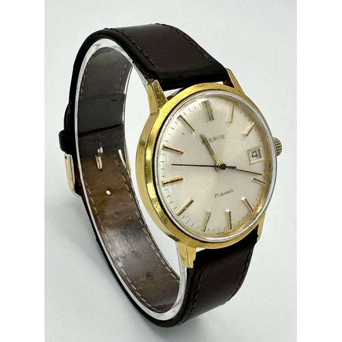 810 - A Vintage Everite 17 Jewels Mechanical Gents Watch. Brown leather strap. gilded case - 34mm. Silver ... 