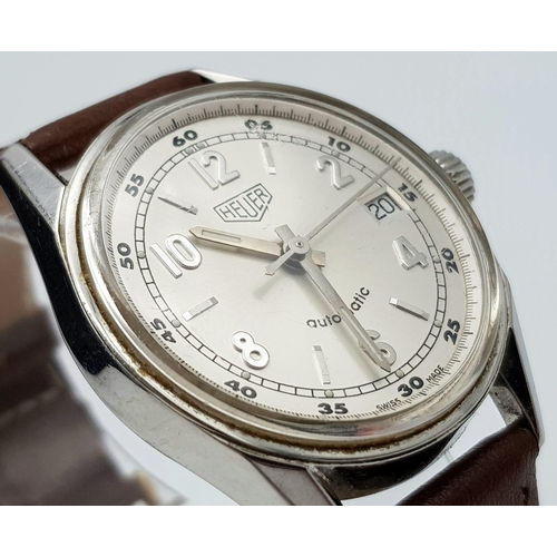 858 - A Tag Heuer Automatic Gents Watch. Brown leather strap. Stainless steel case - 36mm. Silver tone dia... 