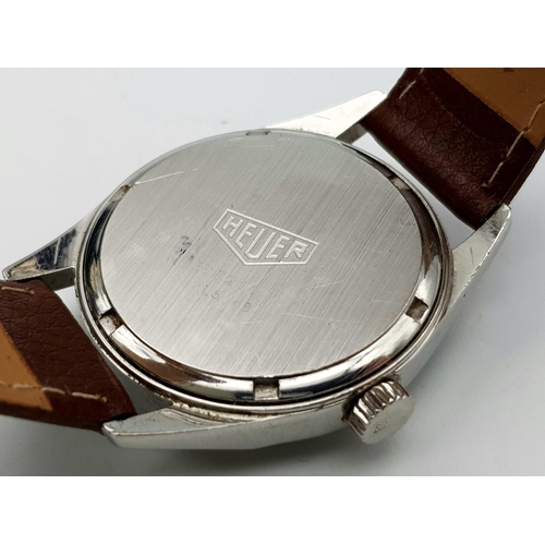 858 - A Tag Heuer Automatic Gents Watch. Brown leather strap. Stainless steel case - 36mm. Silver tone dia... 