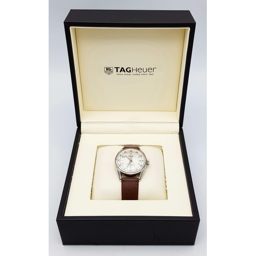 858 - A Tag Heuer Automatic Gents Watch. Brown leather strap. Stainless steel case - 36mm. Silver tone dia... 