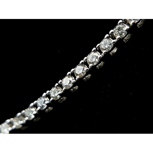 149 - An Icebox 14k White Gold Diamond Tennis Necklace. 256 brilliant round cut diamonds - 7ctw, approx. 5... 