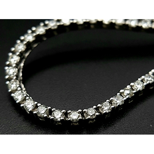 149 - An Icebox 14k White Gold Diamond Tennis Necklace. 256 brilliant round cut diamonds - 7ctw, approx. 5... 