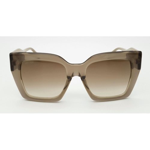 234 - A Pair of Designer Jimmy Choo Beige Eleni Sunglasses. Square style crafted from lightweight acetate.... 