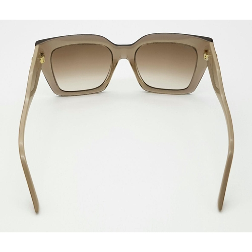 234 - A Pair of Designer Jimmy Choo Beige Eleni Sunglasses. Square style crafted from lightweight acetate.... 