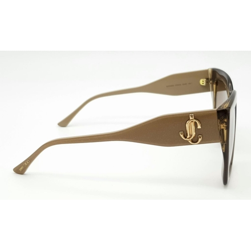 234 - A Pair of Designer Jimmy Choo Beige Eleni Sunglasses. Square style crafted from lightweight acetate.... 