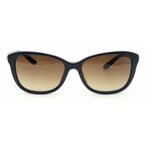 309 - A Pair of Designer Versace Black Sunglasses. White stone and logo embellishment to side frames. Come... 