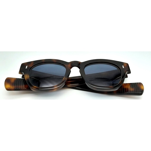 316 - A Pair of Designer Cubitts Sunglasses.