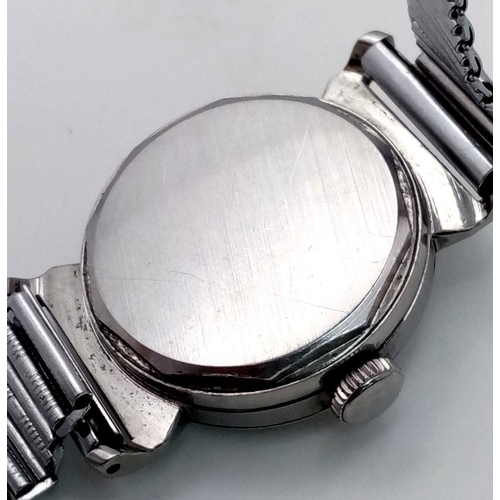 330 - A Vintage Movado Mechanical Ladies Watch. Stainless steel bracelet and case - 29mm. Patinaed two ton... 