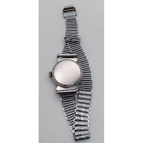 330 - A Vintage Movado Mechanical Ladies Watch. Stainless steel bracelet and case - 29mm. Patinaed two ton... 