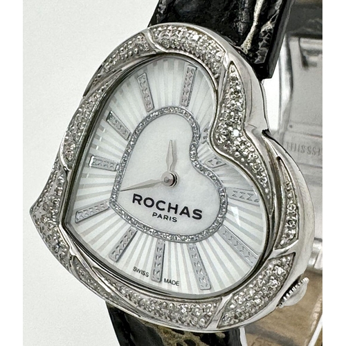 368 - A Rochas of Paris Diamond Ladies Quartz Watch. Black leather strap. Heart shaped case - 36mm. Mother... 