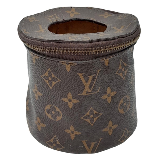 37 - A Louis Vuitton Toilet Paper/Tissue Holder. Monogrammed canvas exterior with gold-toned hardware and... 