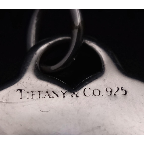 386 - A Tiffany and Co Sterling Silver Heart Pendant. 3cm.