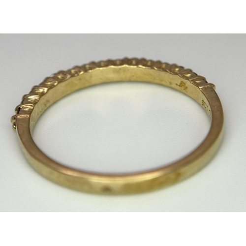 484 - A 9K Yellow Gold Half Eternity Diamond Ring. Size M/N, 1.57g total weight.