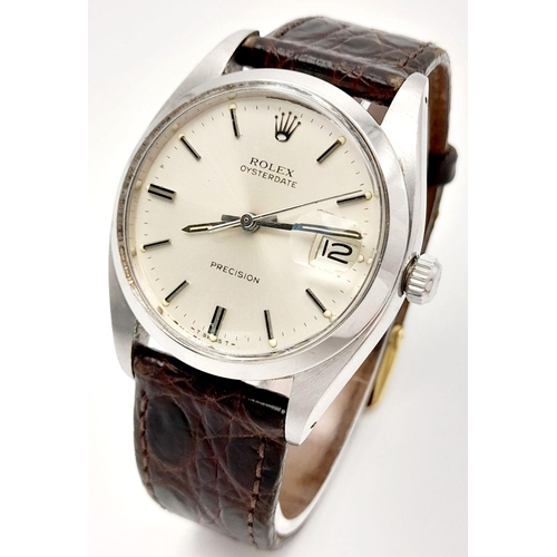 57 - A Vintage Rolex Precision Mechanical Gents Watch. Brown leather strap. Stainless steel case - 34mm. ... 