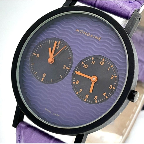 628 - A Mondaine Dual Time Quartz Ladies Watch. Purple leather strap. Case - 36mm. Purple dial with two su... 