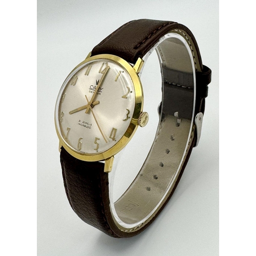 738 - A Vintage Camy 21 Jewels Mechanical Gents Watch. Brown leather strap. Gilded case - 34mm. In working... 