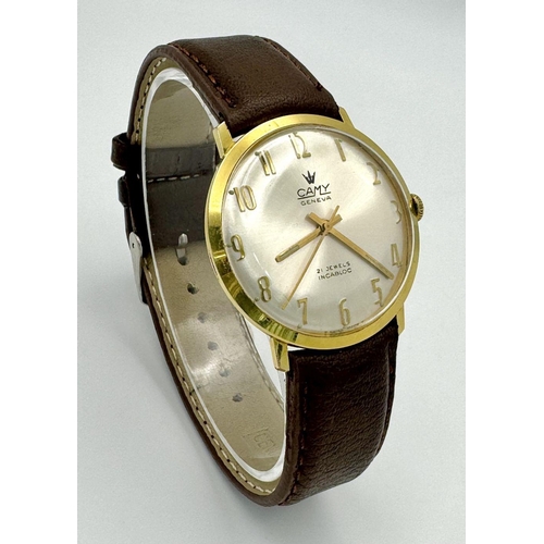 738 - A Vintage Camy 21 Jewels Mechanical Gents Watch. Brown leather strap. Gilded case - 34mm. In working... 