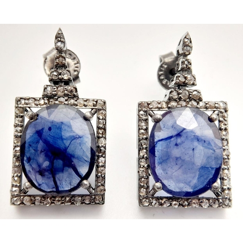 740 - A Sterling Silver Blue Sapphire Silver with Rose cut Diamonds Earrings. Blue sapphire- 7.28 Cts, Dia... 