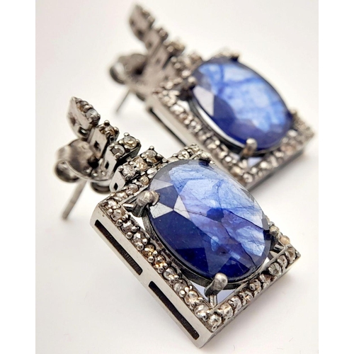 740 - A Sterling Silver Blue Sapphire Silver with Rose cut Diamonds Earrings. Blue sapphire- 7.28 Cts, Dia... 