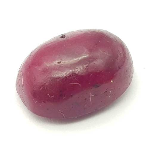 872 - A 9.30 Ct Cabochon Colour Enhanced African Natural Ruby, Oval Shape. Comes with the GLI Certificate.... 