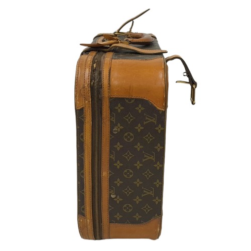 30 - A Louis Vuitton Vintage Small Suitcase. Monogrammed canvas exterior with leather trim, gold-toned ha... 