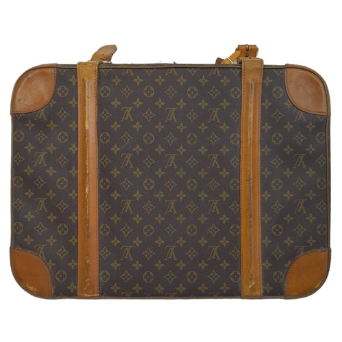 30 - A Louis Vuitton Vintage Small Suitcase. Monogrammed canvas exterior with leather trim, gold-toned ha... 