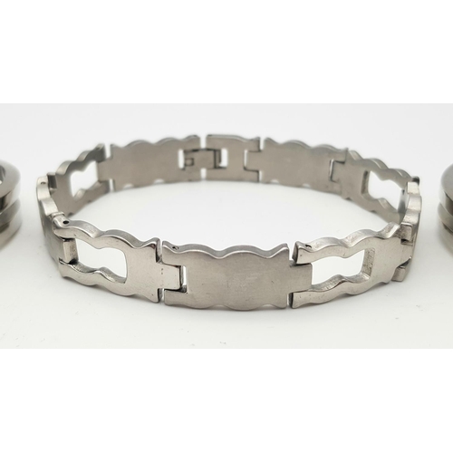 225 - Three Designer Stainless Steel Bracelets. 2 x Armani and a D and G.