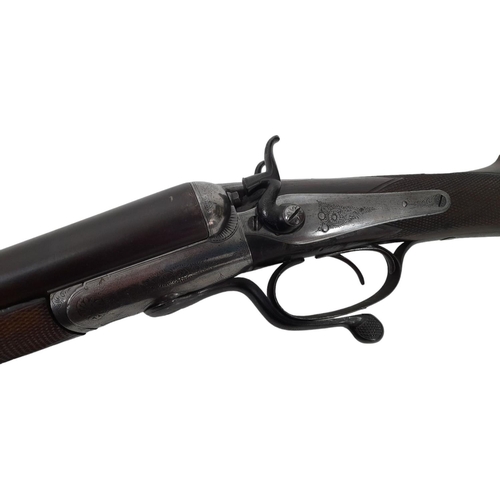 204 - A Deactivated 12 Bore Double Barrel Shotgun By World Famous English Gunmaker R. Adams of London. Dam... 