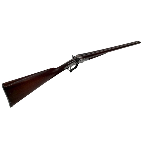 204 - A Deactivated 12 Bore Double Barrel Shotgun By World Famous English Gunmaker R. Adams of London. Dam... 