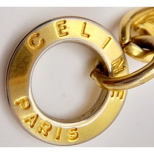 282 - A Designer Celine 1980s Gilded Bauble Bracelet. 19cm.