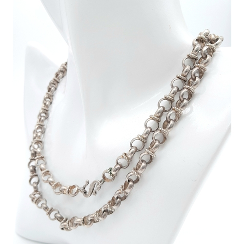 373 - A 999 Silver Interrupted Cable Chain Necklace. S hook clasp. 85cm length, 78.71g weight.