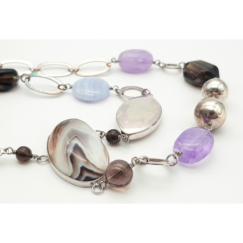 477 - A Multi-Gemstone 925 Silver Necklace. Gemstones include moss agate, amethyst, blue lace agate and sm... 