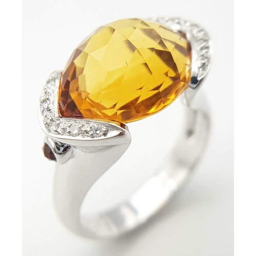 8 - An 18K White Gold Citrine and Diamonds Ring. Size N1/2, 7.58g total weight.